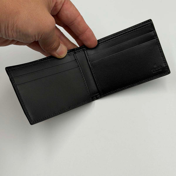 Gucci GG Embossed Leather Bi-fold Wallet - Black