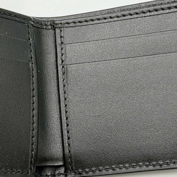 Gucci GG Embossed Leather Bi-fold Wallet - Black