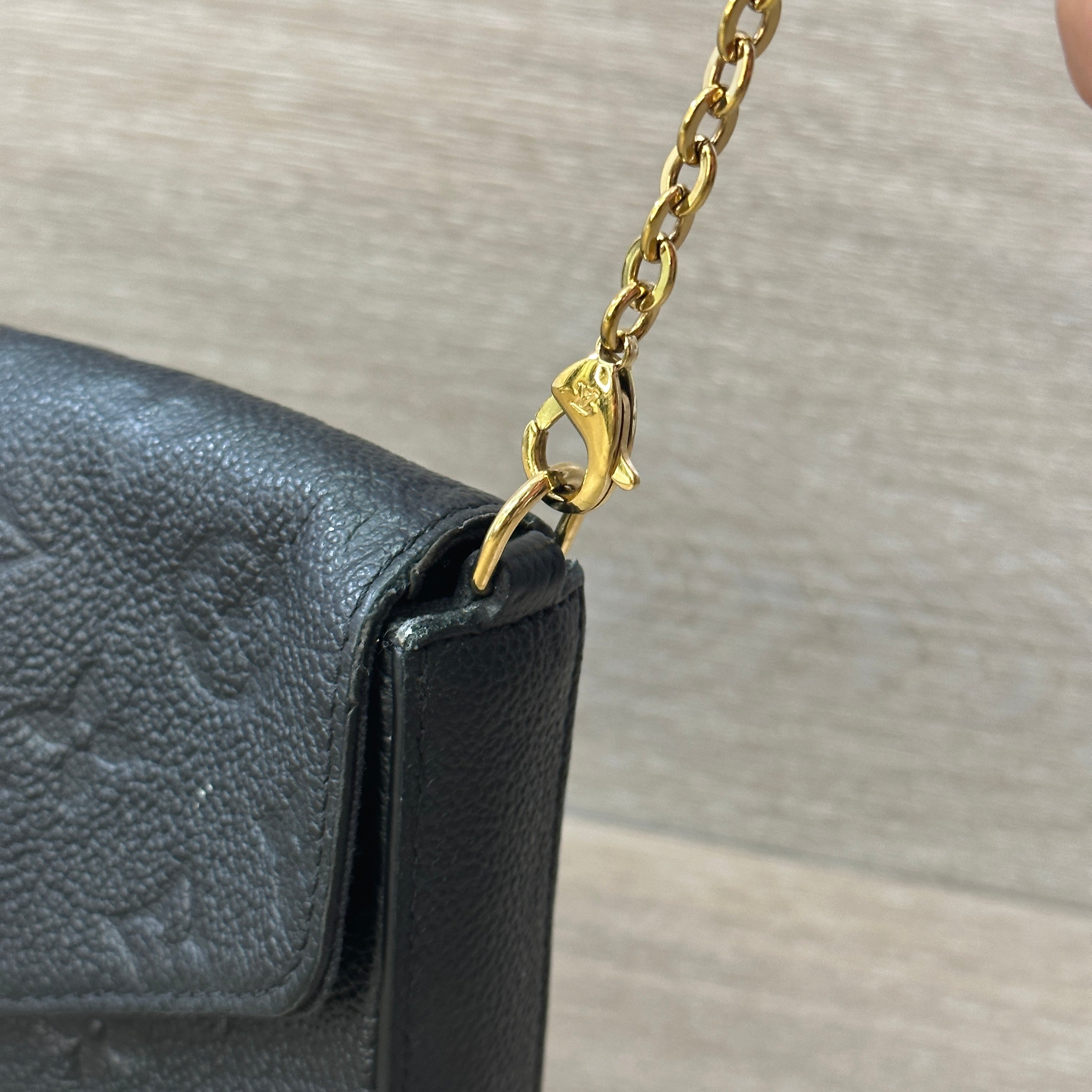 louis vuitton black bag with gold chain