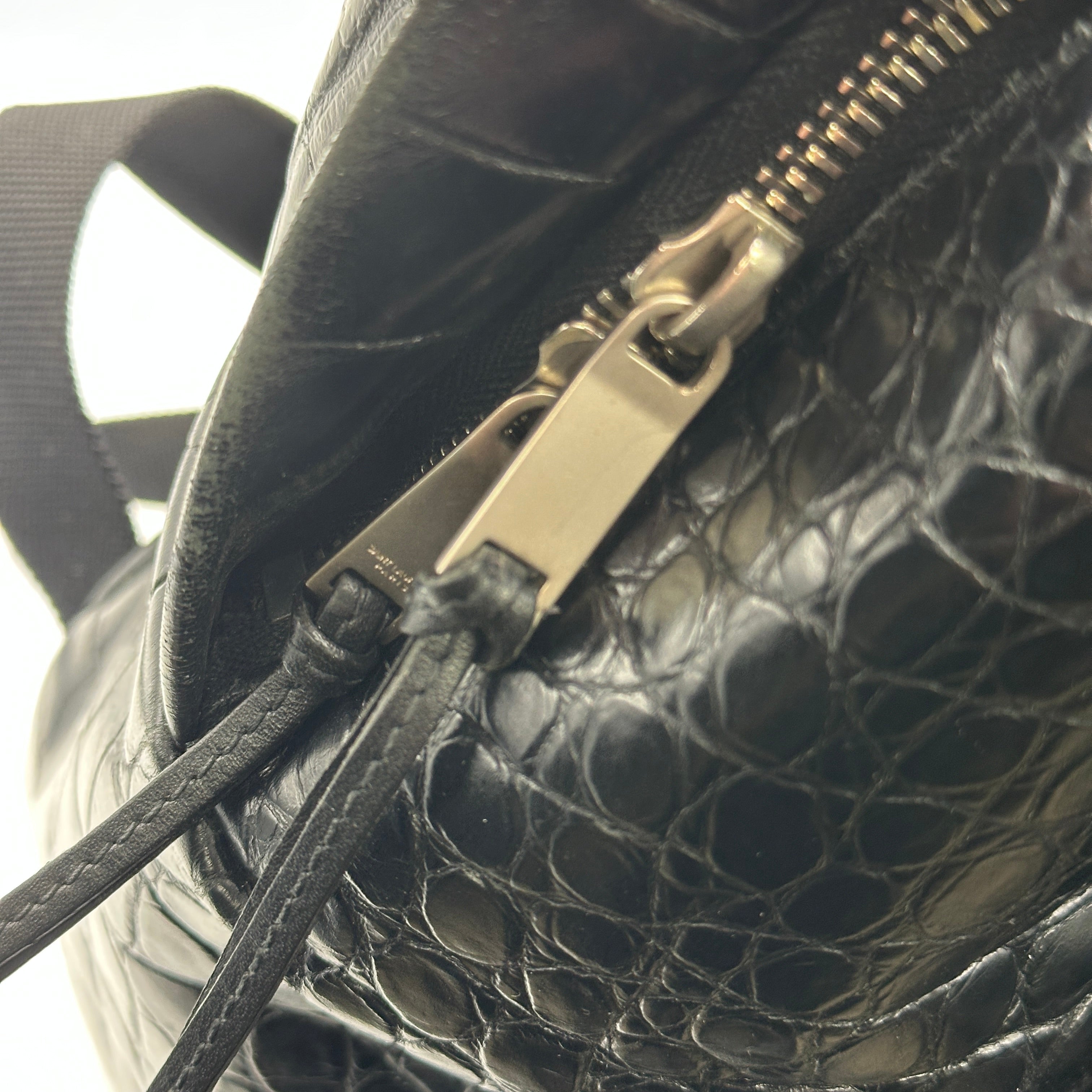 croc embossed leather backpack FR Fashion Co. 13" Men's Crocodile Design 12L x 16H x 5W inches Embossed Calfskin Leather Calfskin Interior Lined Interior Laptop Pocket Interior Zipper Pocket Zipper Front Pockets Side Pockets Saint Laurent City Backpack in