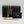 Saint Laurent Upton Chain Wallet in Grain De Poudre Embossed Leather