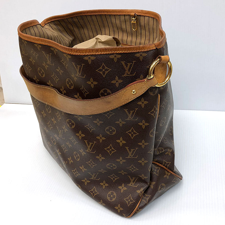 Delightful cloth handbag Louis Vuitton Brown in Cloth - 35908584